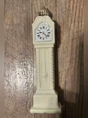 Avon Ivory Grandfather Clock Wall Cologne collectible bottle.